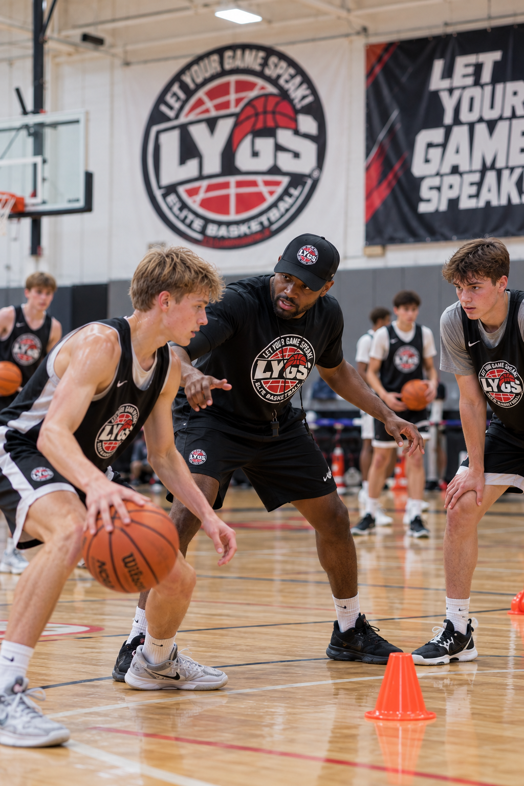 LYGS basketball coach working with athletes during player development training